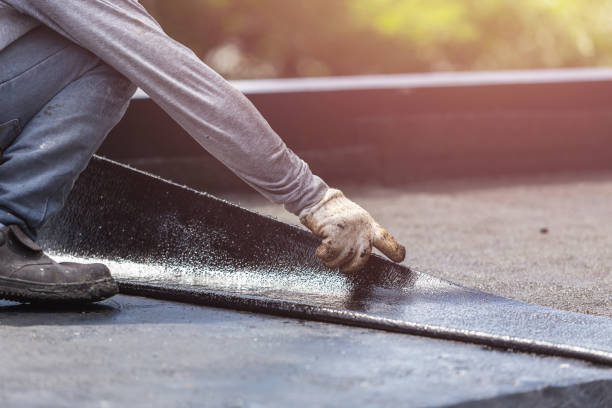 Professional Basement Waterproofing technician working in Plymouth, OH